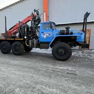 Лесовоз Урал турбированный с манипулятором  и прицепом роспуском